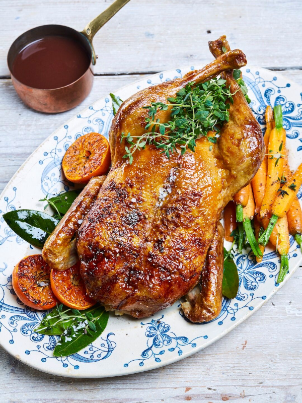 Roast duck with sliced clementines, honey roast carrots & thyme